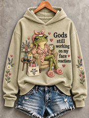 Women's Gods Is Still Working On My Face Reactions Print Sweatshirt